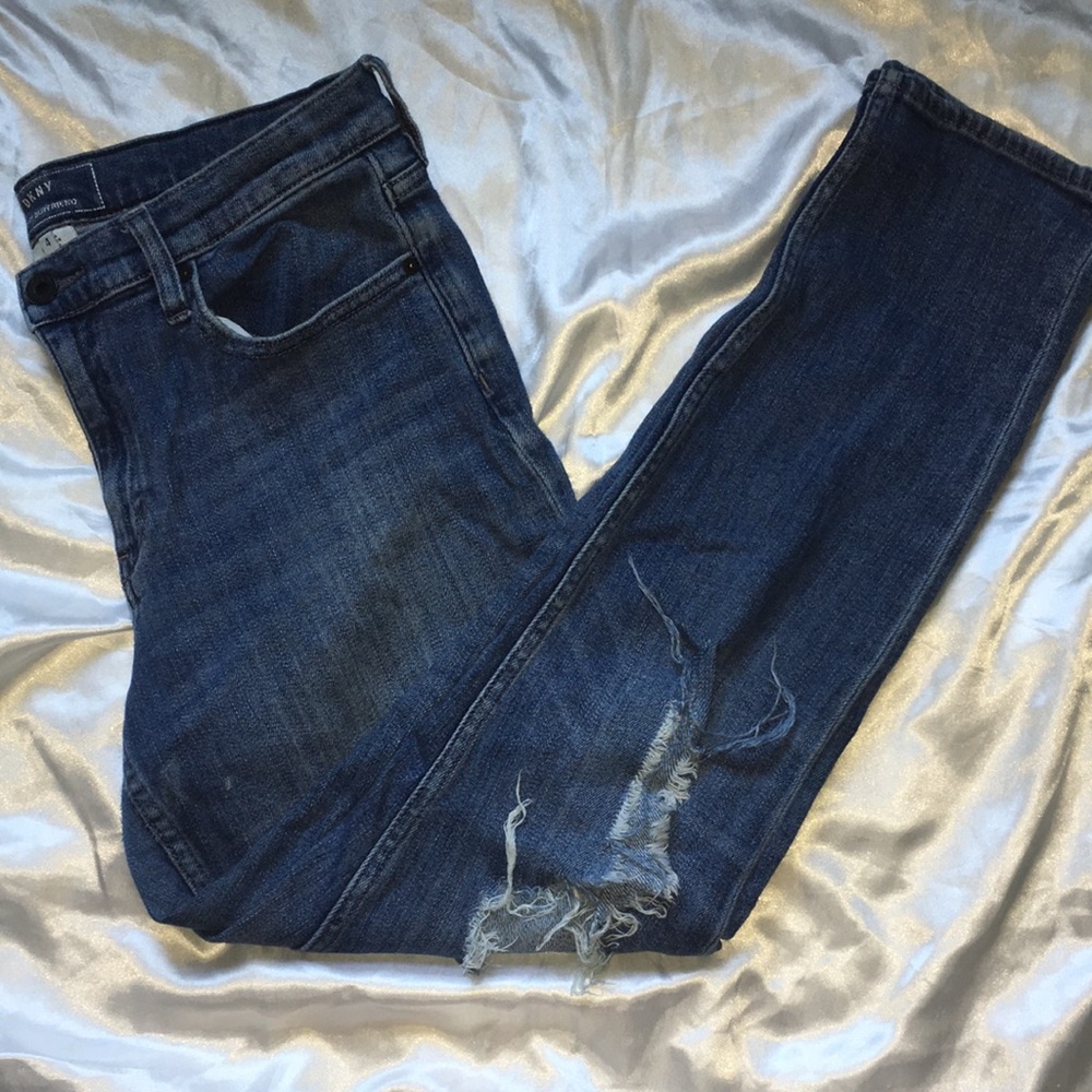 DKNY jeans with rips. Comfy jeans and support all of the baggage.